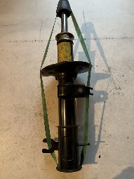 Амортизатор передней подвески левый Daewoo на Chevrolet Aveo  (T200)