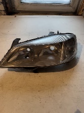 Фара передняя левая GM на Opel Astra G, Zafira A