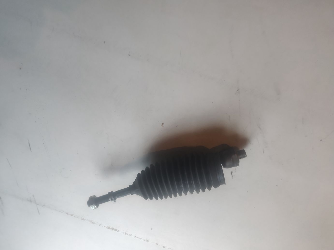 Тяга рулевая с пыльником 01